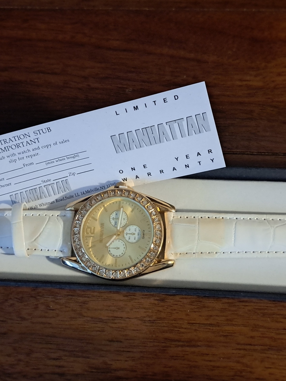 Manhattan Limited Gold-Tone Watch with White Leather Strap